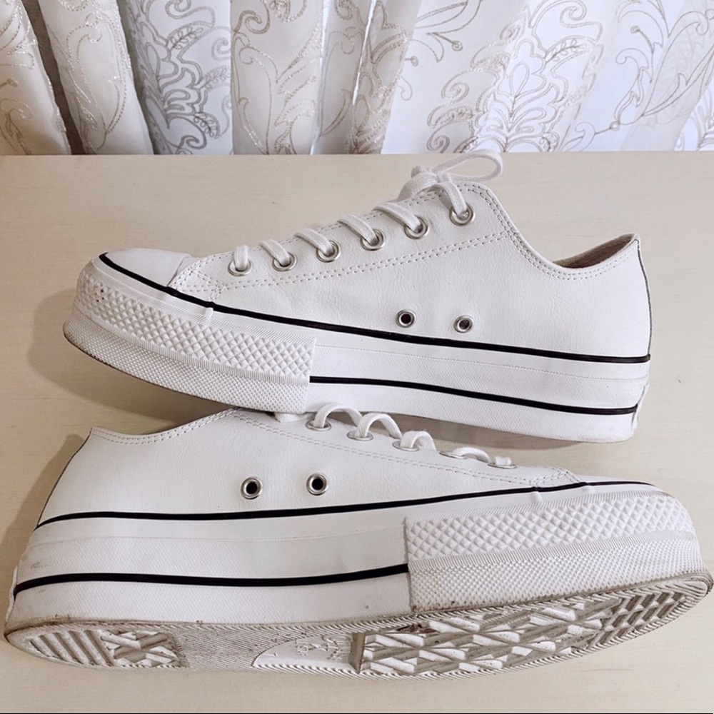 US women’s platform white leather converse.
